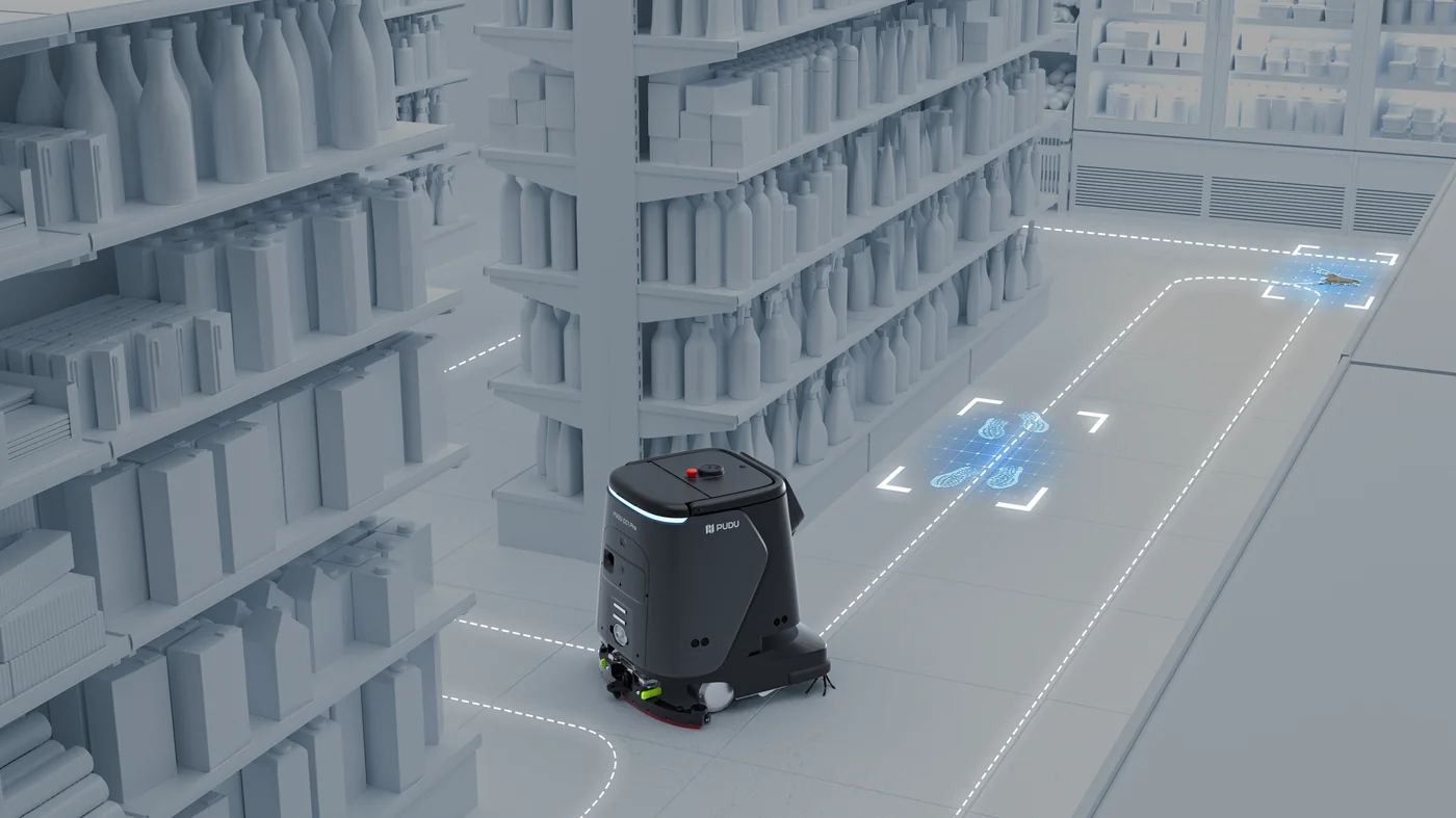 PUDU CC1 Pro AI spot scrubbing system detecting and cleaning wet stains on commercial floor