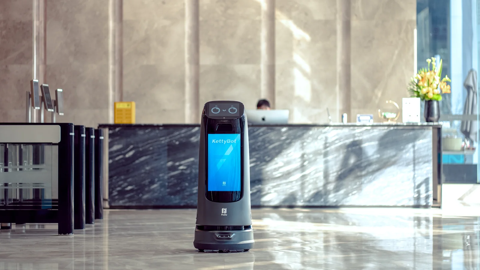 KettyBot Pro greeting in a premium marble lobby